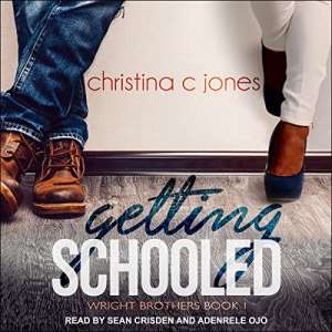 Getting Schooled audiobook cover shows male feet in brown boots and the feet of a Black woman in black pumps