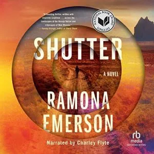 Shutter audiobook cover showing a person walking down a path, away from the viewer, the image appears as if we are looking through a camera lens