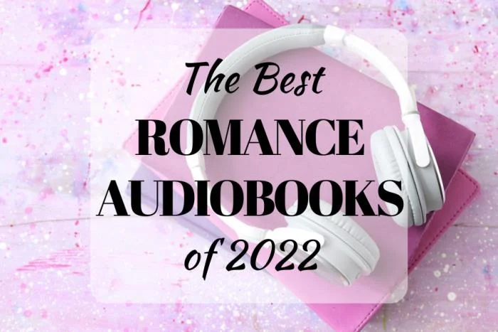 The Best Romance Audiobooks of 2022 (background image showing a stack of pink books with white headphones lying on top)
