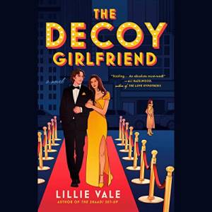 The illustrated voer of The Decoy Girlfriend audiobook shows a red carpet with a brown-haired woman in a golden dress on the arm of a white man in a suit