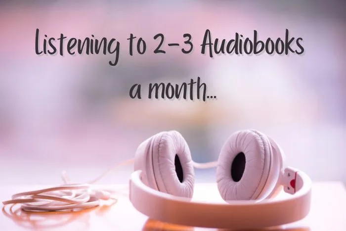 Overlay text: Listening to 2-3 audiobooks a month... (background image showing a pink-tinged photo of light headphones lying on a surface)